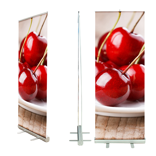 Rollup banner stand number 31, featuring a 3/4 view, side view, and front view. The graphic is of a close up of cherries.