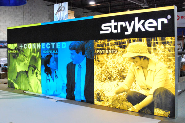 Long lightbox with simple colours overlaying photographs.